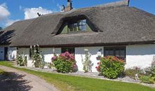 Ferienhaus und -wohnung unterm Reetdach in Woorke