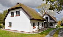 Ferienhaus und -wohnung unterm Reetdach in Woorke