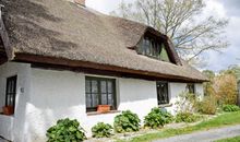 Ferienhaus und -wohnung unterm Reetdach in Woorke
