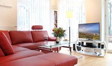 Uns Hüsung Whg. 3 - Blick auf den Wohnbereich und den Fernseher