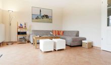 Schneckenhaus Ferienhaus - Blick auf das gemütliche Sofa