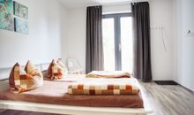 Schlafzimmer mit Ausgang zur Terrasse