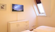 Schlafzimmer mit TV