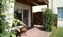 Wohnzimmer Essecke und TV