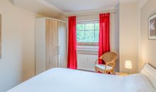 Haus mit Ostsee im Hintergrund