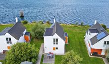 Ferienhaus An der Ostsee by Seeblick Ferien ORO, direkte Wasserlage,Sauna,E-Säule
