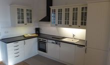 Gut Rattelvitz Parterre A, hochwertig, Sauna, Kamin, eTankstelle, Spielscheune, 15.000qm Parkland