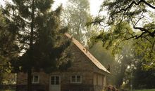 Wohnzimmer mit Kamin im EG
